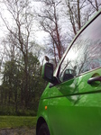 SII20120509_090921 Robin perched on van's wing mirror.jpg